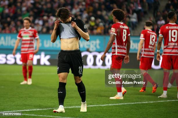 Hiroki Ito of VfB Stuttgart reacts during the Bundesliga match between FC Augsburg and VfB Stuttgart at WWK-Arena on April 21, 2023 in Augsburg,...