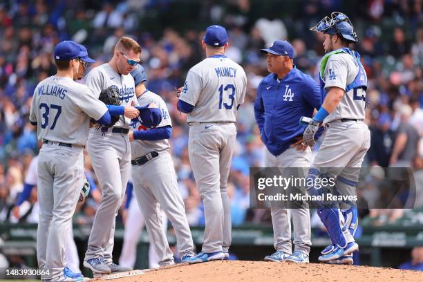 Manager Dave Roberts of the Los Angeles Dodgers looks on against the Chicago Cubs during the fifth inning at Wrigley Field on April 21, 2023 in...