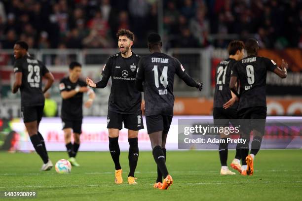 VfB Stuttgart react to their equalizing goal during the Bundesliga match between FC Augsburg and VfB Stuttgart at WWK-Arena on April 21, 2023 in...