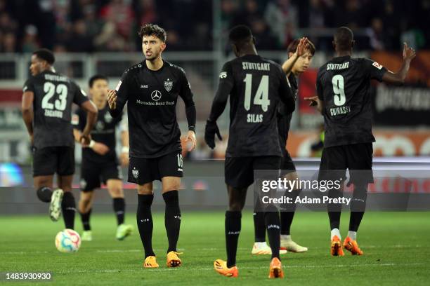 VfB Stuttgart react to their equalizing goal during the Bundesliga match between FC Augsburg and VfB Stuttgart at WWK-Arena on April 21, 2023 in...