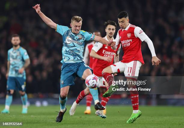 James Ward-Prowse of Southampton controls the ball under pressure from Gabriel Martinelli of Arsenal during the Premier League match between Arsenal...