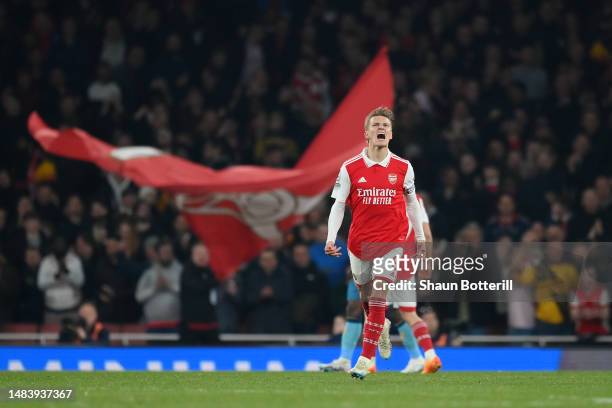 Martin Odegaard of Arsenal celebrates after scoring the team's second goal during the Premier League match between Arsenal FC and Southampton FC at...