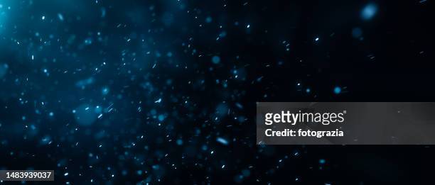 dust defocused particles against dark background - sparks nevada - fotografias e filmes do acervo