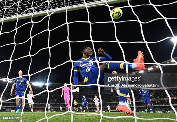 Ibrahim Sulemana of Hellas Verona fails to clear a shot which results in the first goal for Bologna FC scored by Nicolas Dominguez during the Serie A...