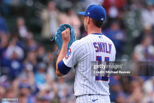 Drew Smyly of the Chicago Cubs acknowledges the fans as he is removed from the game during the eighth inning against the Los Angeles Dodgers at...