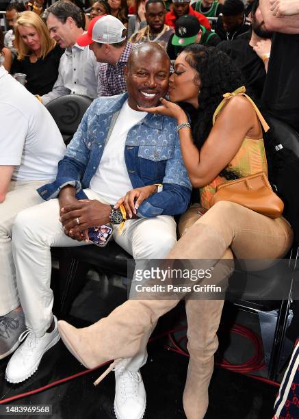 Simon Guobadia and Porsha Williams attend Game Three of the Eastern Conference First Round Playoffs between the Boston Celtics and the Atlanta Hawks...