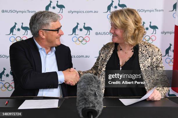 The President of the Australian Olympic Committee, Ian Chesterman, the President of the French Olympic Committee, Ms Brigitte Henriques, sign a...