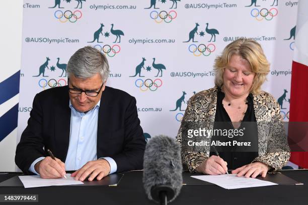 The President of the Australian Olympic Committee, Ian Chesterman, the President of the French Olympic Committee, Ms Brigitte Henriques, sign a...
