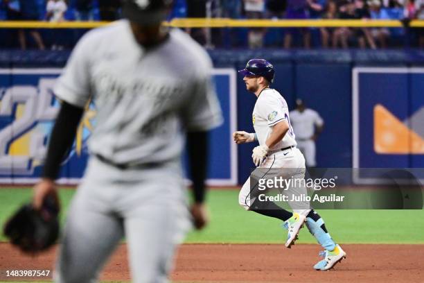 Brandon Lowe of the Tampa Bay Rays runs the bases after hitting a 2-run walk-off home run in the ninth inning to defeat the Chicago White Sox 8-7 at...