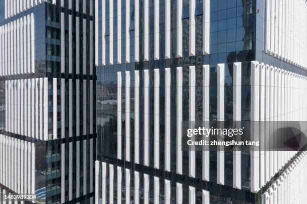 light blue background of glass high rise building skyscraper, commercial modern city of future. - various angles stock pictures, royalty-free photos & images