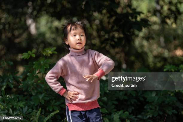 a chinese girl practiced kung fu in the shade - tai chi shadow stock pictures, royalty-free photos & images