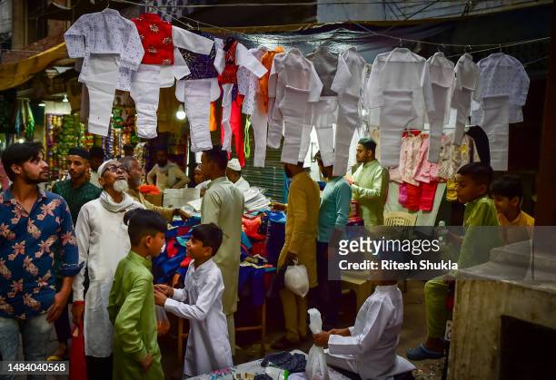 Muslims buy clothes at a market in the back street laneways on the eve of Eid-al-fitr on April 21, 2023 in Varanasi, India. Muslims make up a...