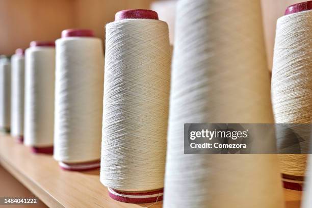 cream colored cotton & hemp yarn - spindle stock pictures, royalty-free photos & images