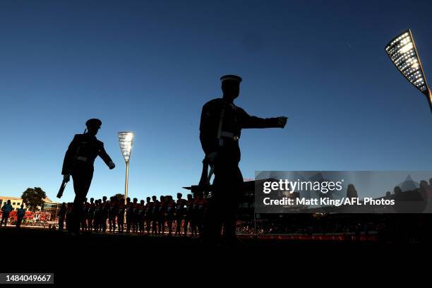 General view of the Anzac Ceremony during the round six AFL match between Greater Western Sydney Giants and Brisbane Lions at Manuka Oval, on April...