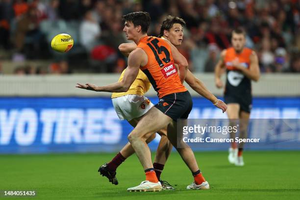 Sam Taylor of the Giants gathers the ball during the round six AFL match between Greater Western Sydney Giants and Brisbane Lions at Manuka Oval, on...