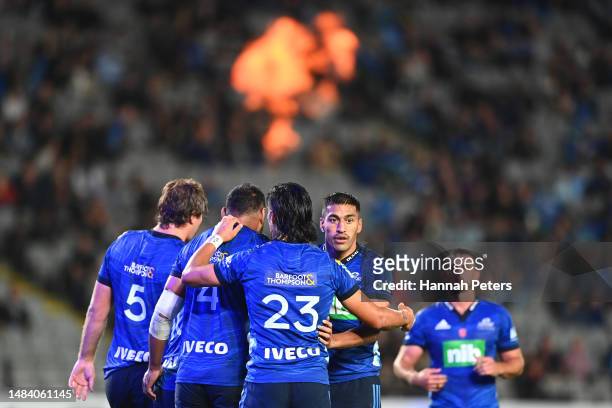 The Blues celebrate Ricky Riccitelli's second try during the round nine Super Rugby Pacific match between Blues and NSW Waratahs at Eden Park, on...