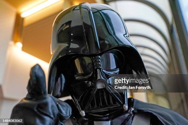 Man dressed as Darth Vader reacts to the camera on the first day of the Scarborough Sci-Fi weekend on April 22, 2023 in Scarborough, England. The...