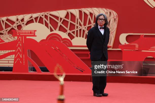 Director Peter Chan Ho-Sun arrives at opening ceremony red carpet for the 2023 Beijing International Film Festival at Yanqi Lake International...