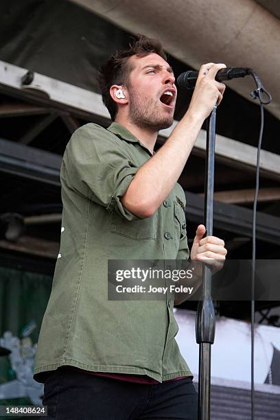 Josh Franceschi of the British rock band, You Me at Six performs onstage during the 2012 Vans Warped Tour at Klipsch Music Center on July 10, 2012 in...