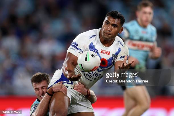 Tevita Pangai Junior of the Bulldogs passes the ball during the round eight NRL match between Canterbury Bulldogs and Cronulla Sharks at Accor...