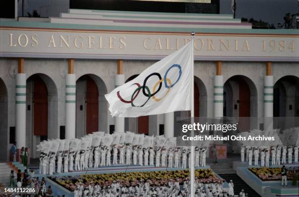 The Olympic Flag during the closing ceremony of the 1984 Summer Olympics, held at the Los Angeles Memorial Coliseum in Los Angeles, California, 28th...
