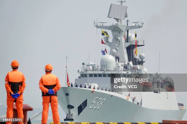 The guided-missile frigate Yantai arrives at Yantai Port during a celebration activity to celebrate the 74th anniversary of the founding of the...