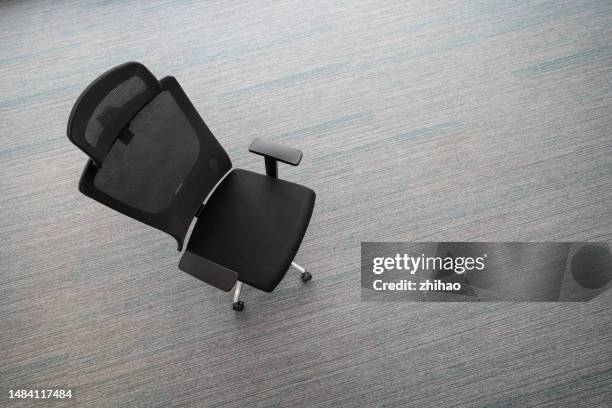 high angle view of an empty chair - unemployment benefits stock pictures, royalty-free photos & images