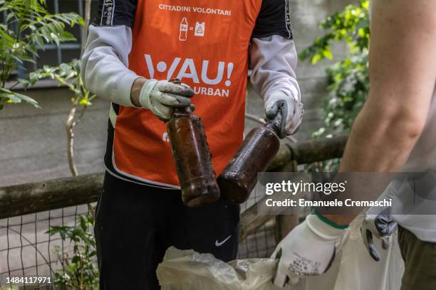 Volunteers take part in a clean up event held by association WAU! to clean the streets and the public spaces of Certosa district on the occasion of...