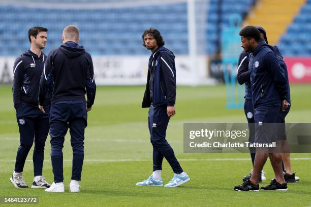 Mani Mellor and team mates of Rochdale inspect the pitch prior to the Sky Bet League Two between Stockport County and Rochdale at Edgeley Park on...