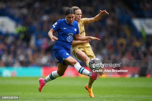 Sam Kerr of Chelsea and Irene Paredes of FC Barcelona battle for the ball during the UEFA Women's Champions League semifinal 1st leg match between...