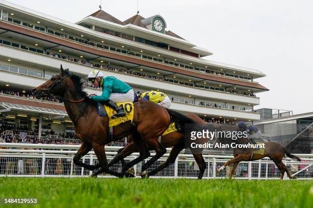 Rob Hornby riding Remarquee win The Dubai Duty Free Stakes at Newbury Racecourse on April 22, 2023 in Newbury, England.