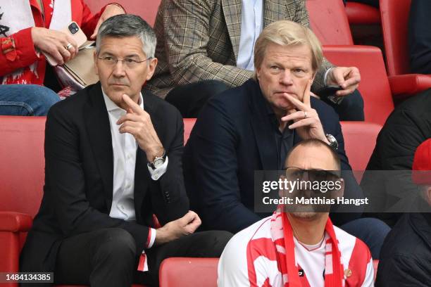 Herbert Hainer and Oliver Kahn, CEO of FC Bayern Munich look on from the stands prior to the Bundesliga match between 1. FSV Mainz 05 and FC Bayern...