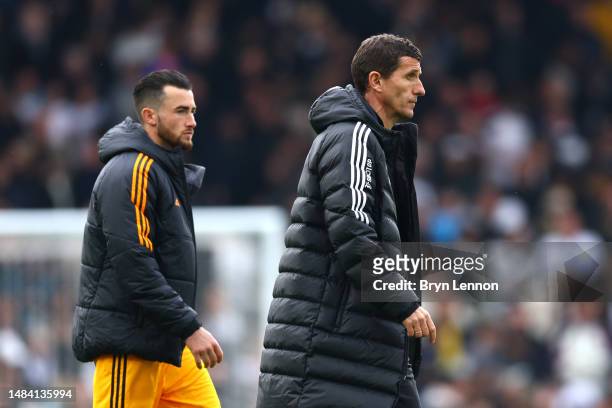 Jack Harrison and Javi Gracia, Manager of Leeds United, look dejected following the Premier League match between Fulham FC and Leeds United at Craven...
