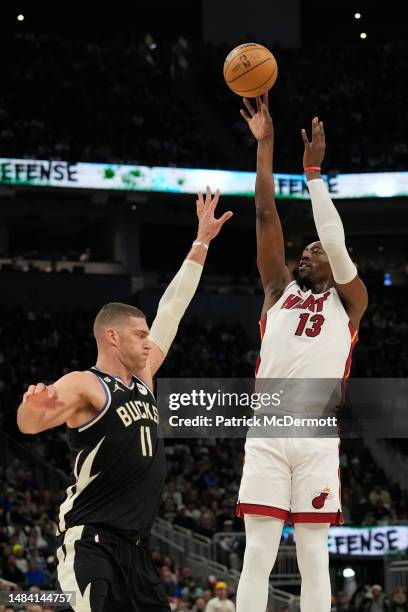 Bam Adebayo of the Miami Heat shoots the ball against Brook Lopez of the Milwaukee Bucks during the second half of Game Two of the Eastern Conference...