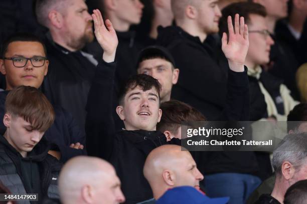 Rochdale fans react during the Sky Bet League Two between Stockport County and Rochdale at Edgeley Park on April 22, 2023 in Stockport, England.
