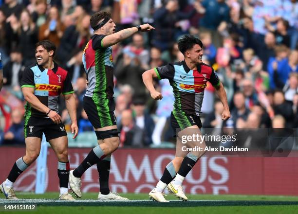 Marcus Smith of Harlequins celebrates scoring his sides 3rd try during the Gallagher Premiership Rugby match between Harlequins and Bath Rugby at...