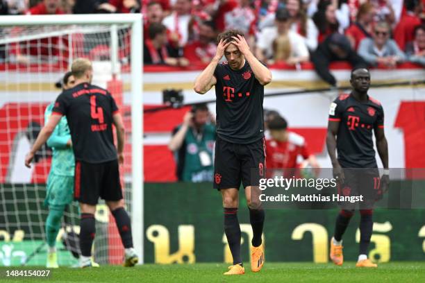 Leon Goretzka of FC Bayern Munich reacts after Ludovic Ajorque of 1.FSV Mainz 05 scored the team's first goal during the Bundesliga match between 1....