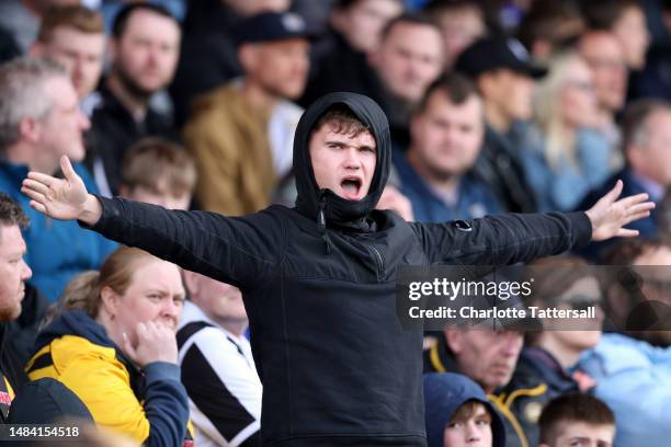 Rochdale fans react during the Sky Bet League Two between Stockport County and Rochdale at Edgeley Park on April 22, 2023 in Stockport, England.