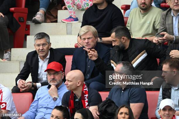Herbert Hainer, Oliver Kahn and Hasan Salihamidzic, Sporting Director of FC Bayern Munich look on during the Bundesliga match between 1. FSV Mainz 05...