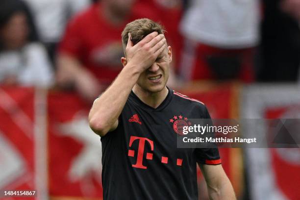 Joshua Kimmich of FC Bayern Munich reacts during the Bundesliga match between 1. FSV Mainz 05 and FC Bayern München at MEWA Arena on April 22, 2023...