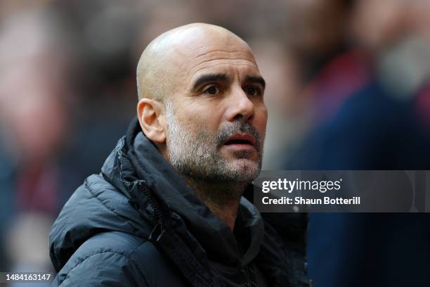 Pep Guardiola, Manager of Manchester City, looks on prior to the FA Cup Semi Final match between Manchester City and Sheffield United at Wembley...