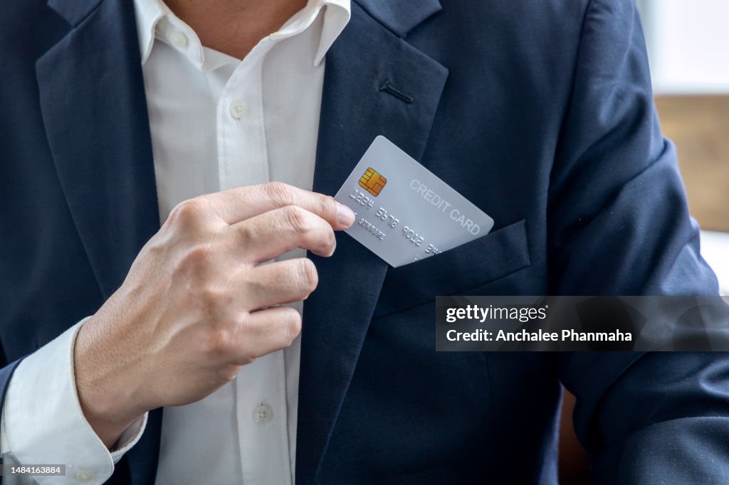 Finance concept, Credit card in the pocket suit