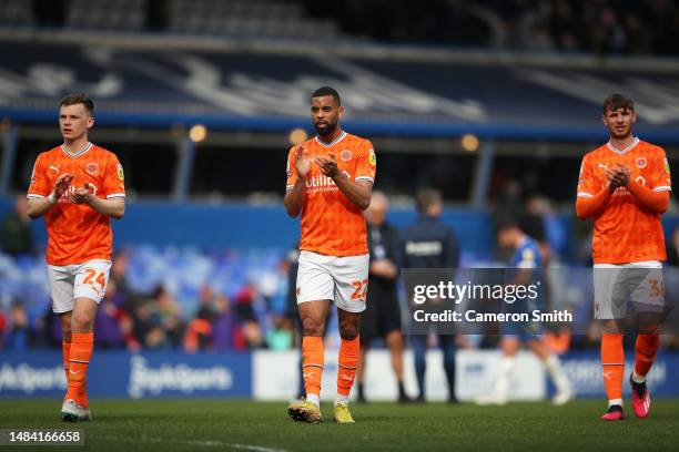 Callum Wright, CJ Hamilton and Brad Holmes of Blackpool acknowledges the fans following the Sky Bet Championship between Birmingham City and...