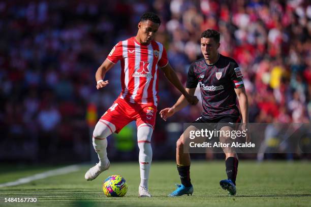 Lazaro of UD Almeria battles for possession with Oscar de Marcos of Athletic Club during the LaLiga Santander match between UD Almeria and Athletic...