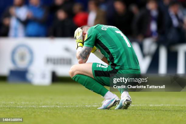 Richard O'Donnell of Rochdale looks dejected following their sides relegation into the National League following their sides defeat in the Sky Bet...