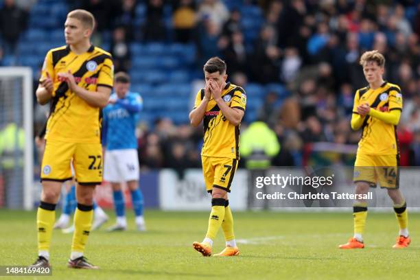 Liam Kelly of Rochdale looks dejected following their sides relegation into the National League following their sides defeat in the Sky Bet League...