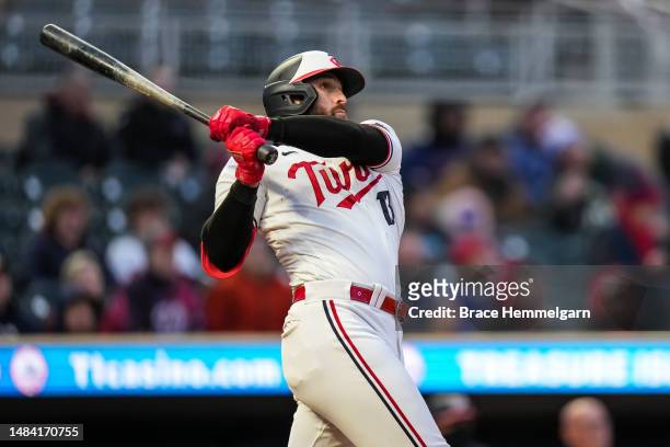 Joey Gallo of the Minnesota Twins bats and hits a home run against the Washington Nationals on April 21, 2023 at Target Field in Minneapolis,...