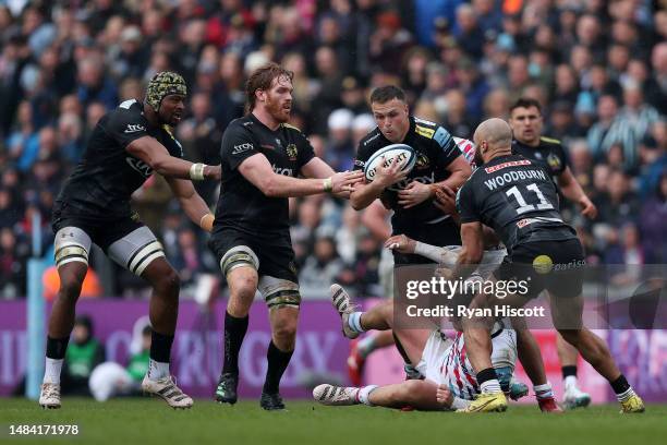 Joe Simmonds of Exeter Chiefs gathers the loose ball with teammates Christ Tshiunza, Jannes Kirsten and Olly Woodburn during the Gallagher...