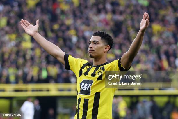 Jude Bellingham of Borussia Dortmund celebrates after scoring the team's first goal during the Bundesliga match between Borussia Dortmund and...