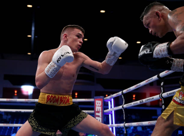 Boxers Brandon Scott and Karan Gill in action during their super bantamweight bout at the Motorpoint Arena Cardiff on April 22, 2023 in Cardiff,...